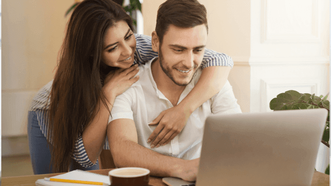 Man and woman planning kitchen online