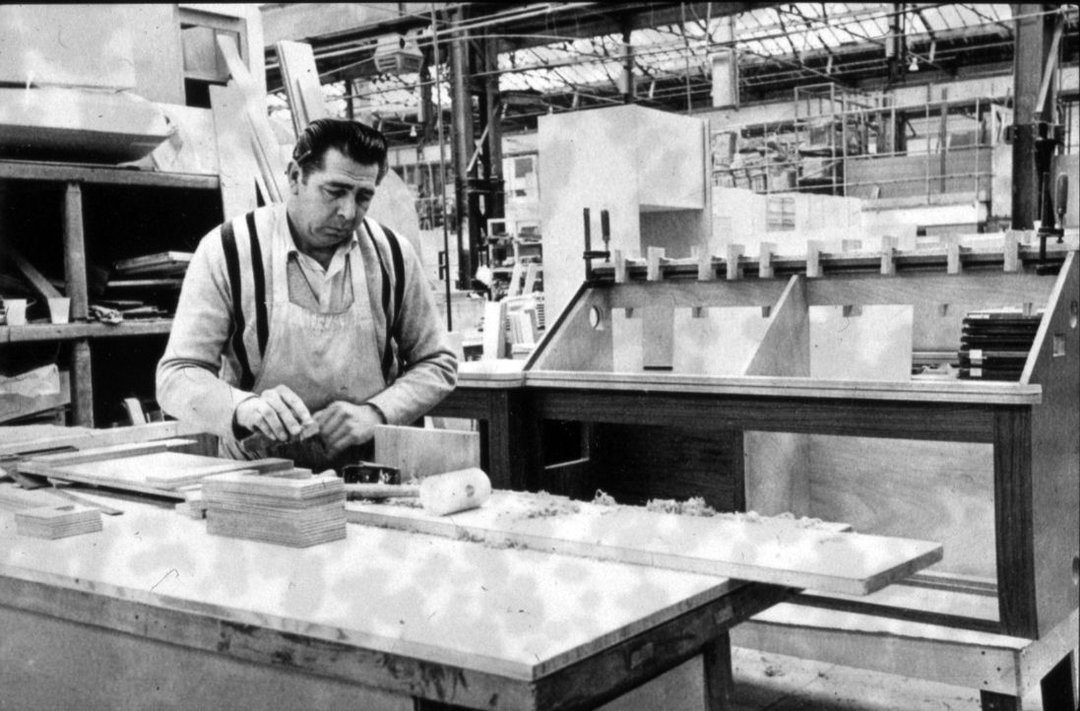 Person manufacturing doors decades ago